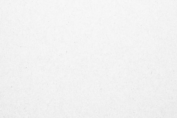 White recycle paper cardboard surface texture background White recycle paper cardboard surface texture background grainy stock pictures, royalty-free photos & images