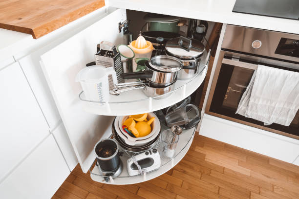 istock Open corner cabinet with pots and pans 1279718209
