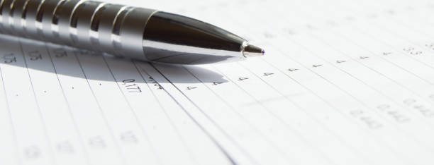 istock Silver pen on financial reports with Analytics and summaries, business concepts 1279718495