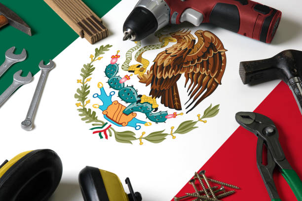 Mexico flag on repair tool concept wooden table background. Mechanical service theme with national objects.