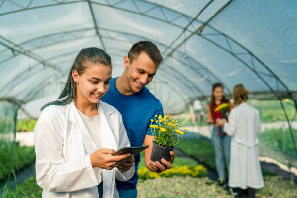istock College Students Working Together in Greenhouse 1279719121
