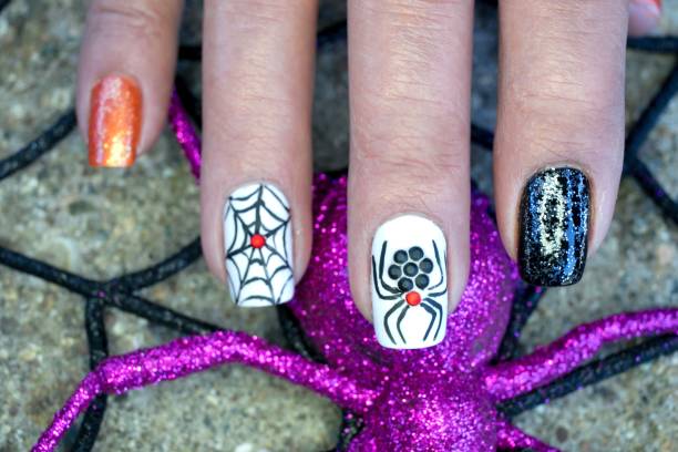 spider web nail art design - color image halloween people elegance photos et images de collection