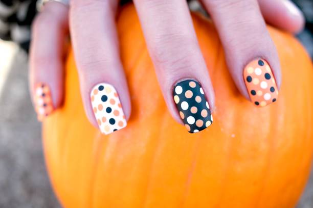 Polka Dots Nail Art Design Fall Inspired Art fall nail art stock pictures, royalty-free photos & images