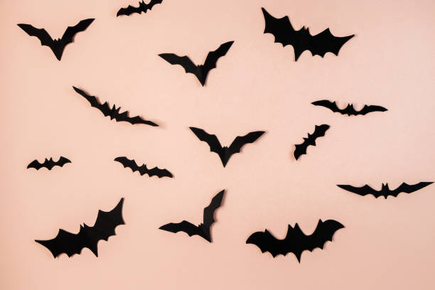 istock Happy Halloween. Bats on pink pastel background. 1279726704