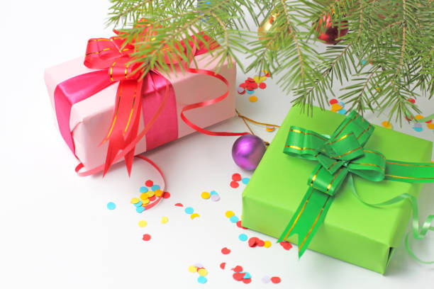 istock Christmas or New Year presents concept under xmas tree branches. 1279728655