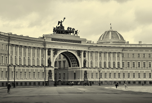High arch with six horses on the pediment. Monument of classicism architecture of the XIX century, Sepia color