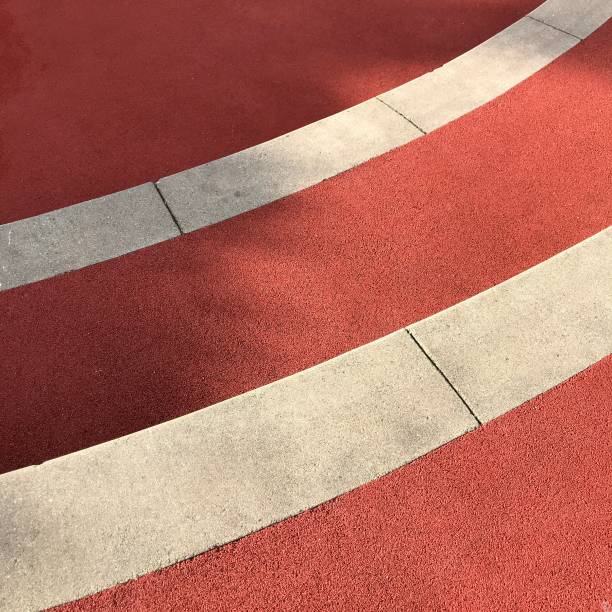 istock Red and white safety rubber flooring on curved steps in schoolyard 1279733564
