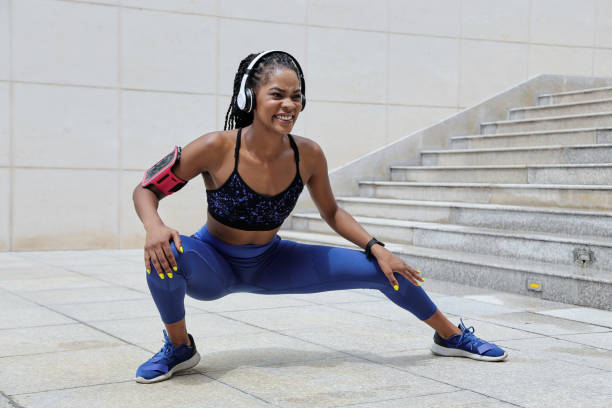 istock Sportswoman working out outdoors 1279737109