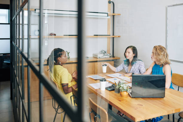 istock Businesswomen discussing company development 1279738974