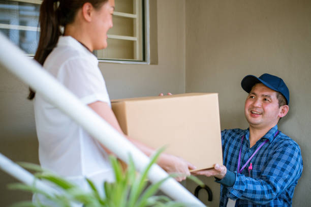 istock Home delivery of a box to the client 1279739714