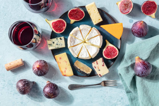 istock Cheese and wine tasting, cheese platter with figs, a flat lay 1279750634