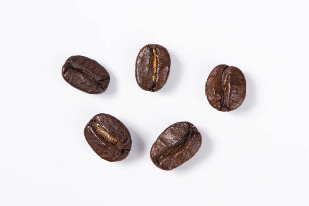istock Coffee beans isolated on white background. close up. 1279753206