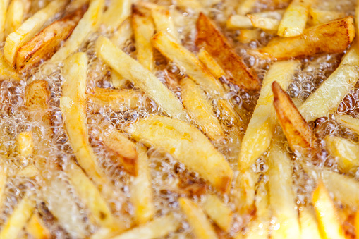 homemade french fries in hot oil