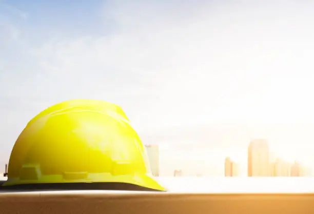 Hardhat with cityscape background. Happy Labor Day