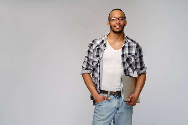 istock A young african american man working with a laptop pc 1279757167