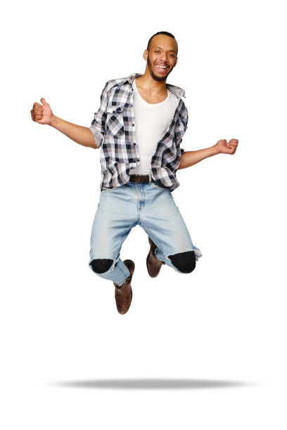 istock Casual african-american man jumping in studio over white background 1279757206