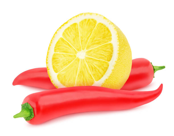 istock Composition with red hot chili pepper and lemon. On white background. 1279760448