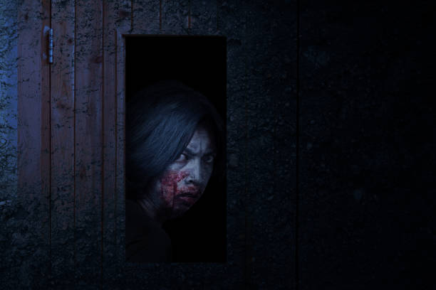 istock Scary zombie standing behind the door 1279760732