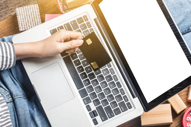 istock A woman is using a computer to shop online 1279761902
