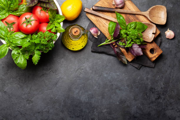 istock Italian cuisine ingredients. Tomatoes, herbs and spices 1279762335