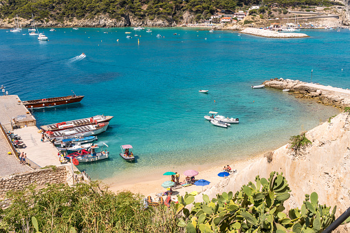 Tremiti Islands, Puglia, Italy, July 2020: Little beach near the touristic port of San Nicola Island, the main island of the small archipelago of the tremiti islands.