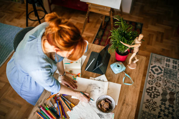 istock Preparing sketches for canvas painting 1279766870