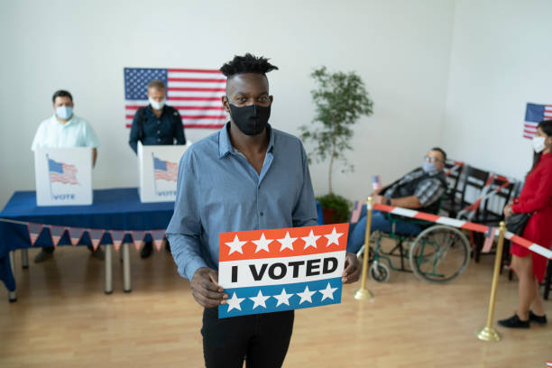 istock Afro-American young man on election day 1279768556