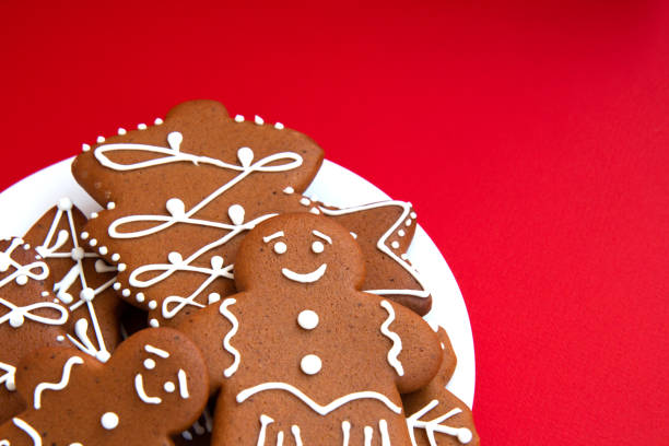 istock Christmas gingerbread cookie on a bright red background 1279768647