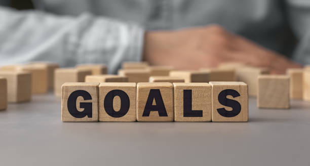 istock Word GOALS is made from cube wooden blocks on a desk 1279769706