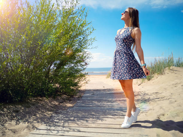 istock girl on the beach 1279770304