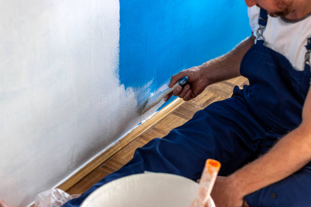 istock Painting apartment, renovating with white color. 1279771417