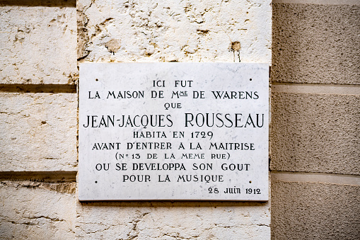 A plaque remembering the place of a house where Jean-Jacque Rousseau resided in 1729. It is in Annecy, France, near the Swiss border.