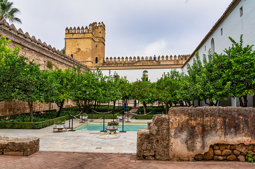 Cordoba, Spain - October 31, 2019: View of the gardens of the Alcazar of the Christian Monarchs, Alcazar de los Reyes Cristianos in Cordoba, Andalusia, Spain