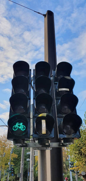 istock Traffic light system for cyclists and tram in beautiful weather against blue sky 1279776646