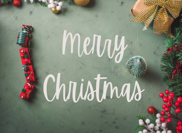 istock Christmas festive green background with toy train 1279780047