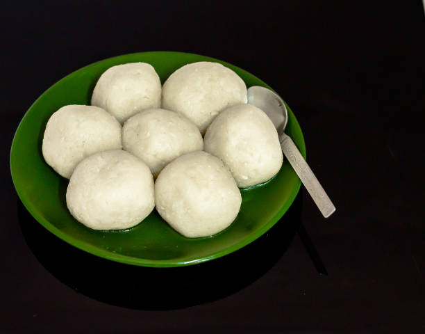 Roshogolla/Rasgulla. Plate fiull of Bengali Famous Sweet Roshogolla ,a Syrupy Dessert Popular in India. Selective focus is used. rosogolla stock pictures, royalty-free photos & images