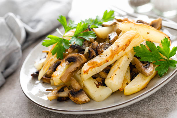 istock Potato fried with mushrooms 1279780220