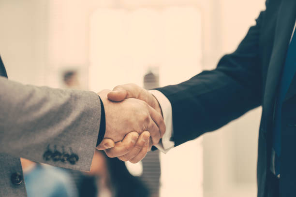 istock firm business handshake on a blurry office background 1279783028