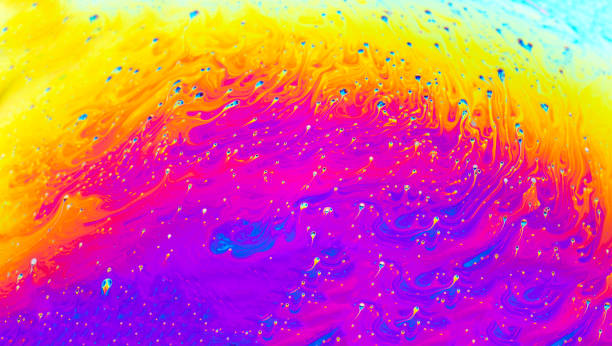istock Abstract background with colorful gradient colors. Soap bubble close up macro abstraction. 1279784588