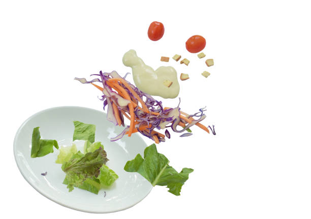 istock fresh vegetable salad topping crispy bread dressing mayonnaise sauce floating on plate in white background 1279785543