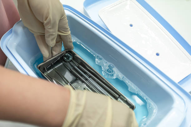 istock Hands are cleaning medical instruments. 1279787632