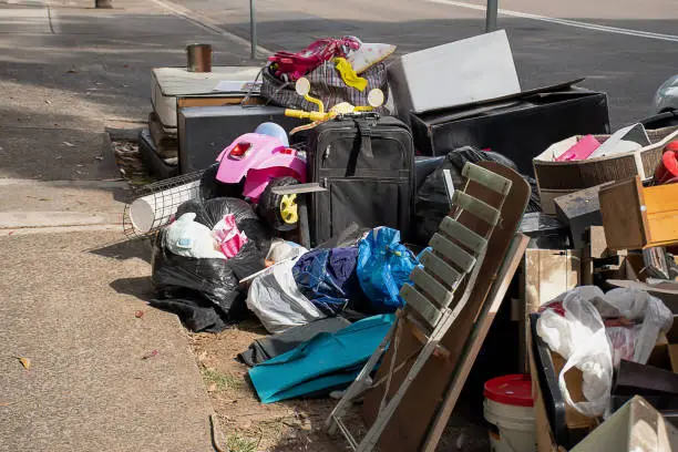 Household miscellaneous rubbish items put on curbside for council bulk waste collection.