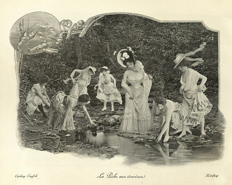 Antique photomontage photograph, Young women catching crayfish in wooldand stream, Victorian, 19th Century.