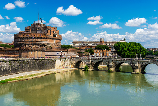 Rome, Italy - June 1, 2014: The Mausoleum of Hadrian, also known as Castel Sant'Angelo (Castle of the Holy Angel), is a fort in Parco Adriano, Rome, Italy. It was initially commissioned by the Roman Emperor Hadrian as a mausoleum for himself and his family. The building was later used by the popes as a fortress and castle, and is now a museum.