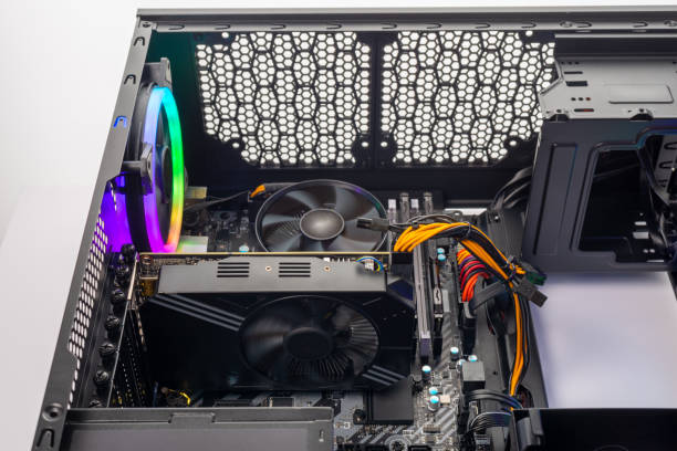 istock Studio shot of black Gaming desktop pc with rgb lights and visible components. 1279796332