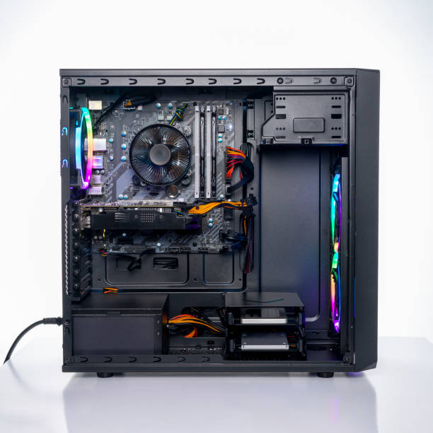 istock Studio shot of black Gaming desktop pc with rgb lights and visible components. 1279796370