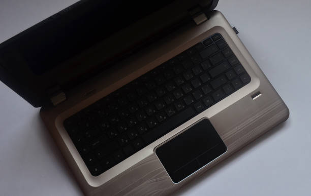 istock Office table. Black laptop keyboard with Russian and English layout. Background. 1279796598