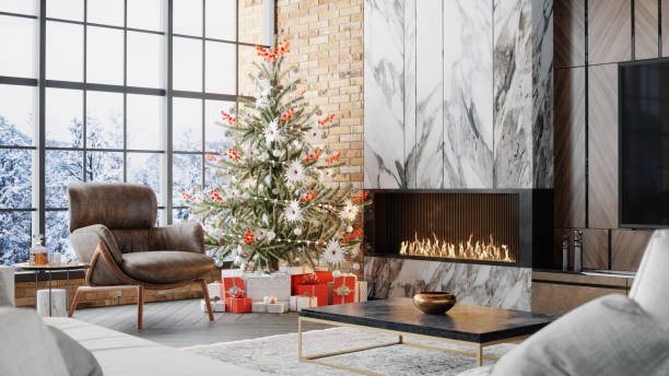 Luxury Living Room With Fireplace And Christmas Decoration Fireplace, christmas tree and presents in a luxurious chalet with snowy mountain view. chalet stock pictures, royalty-free photos & images
