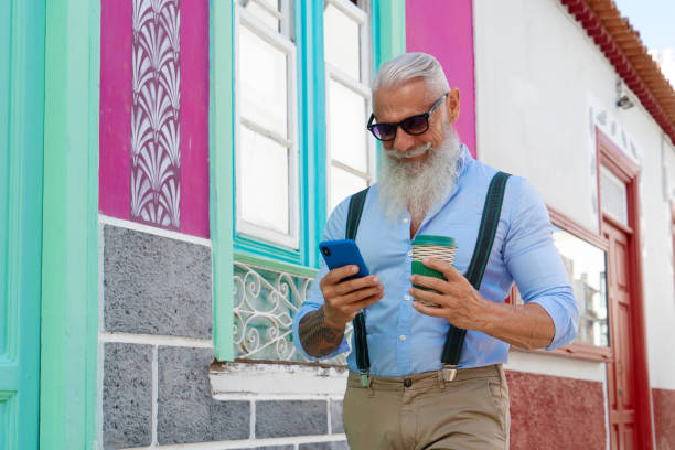 istock Senior man with a phone 1279800363