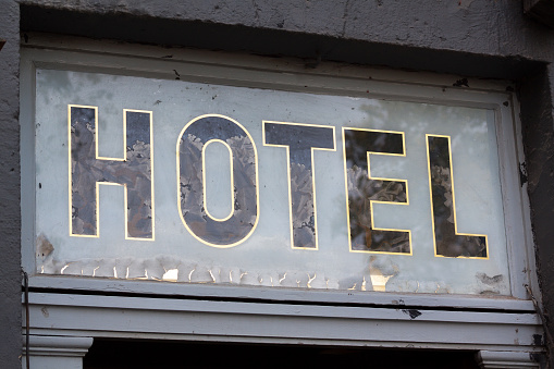 Grunged HOTEL word and sign